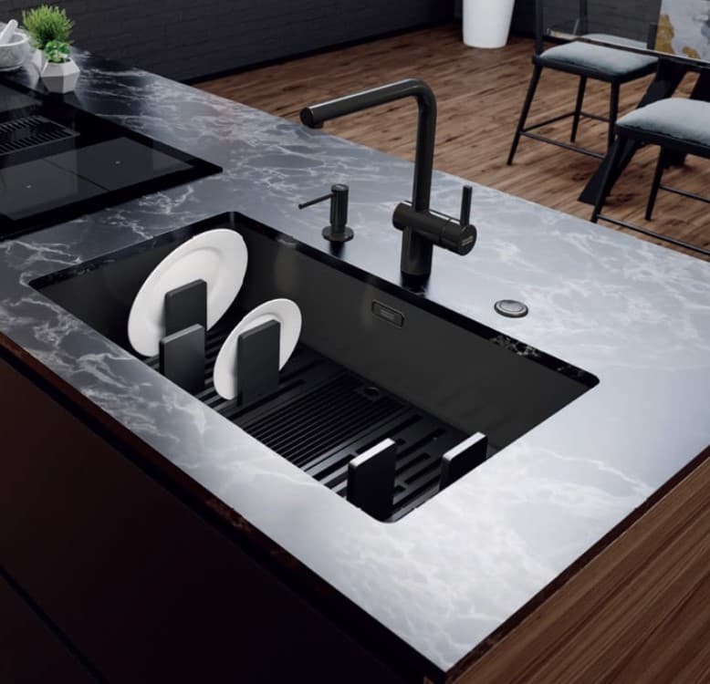 Undermount sink with a faucet in a matching color