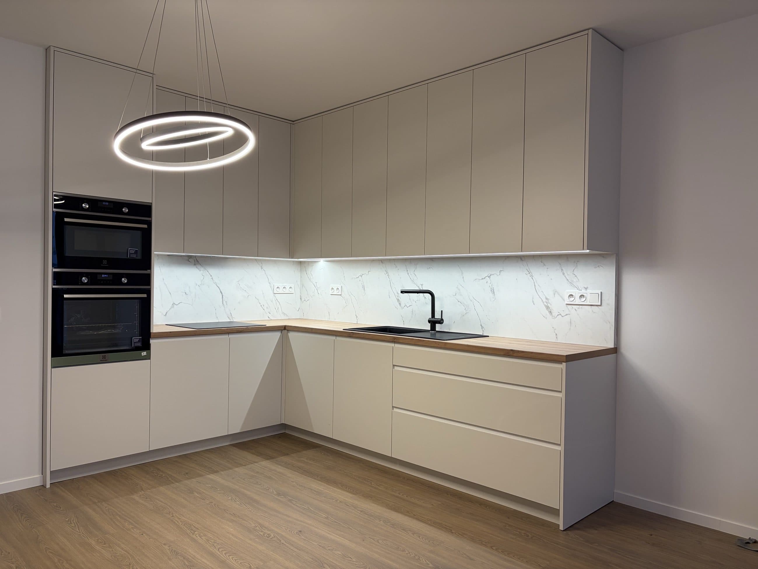White laminate kitchen with integrated pulls, Letňany apartment